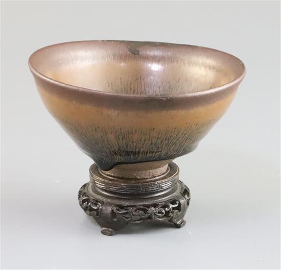 A Chinese Jian type hares fur bowl, Qing dynasty, D. 12.3cm, wood stand